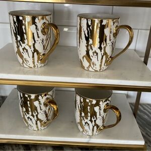 Elegant Gold and White Ceramic Mugs